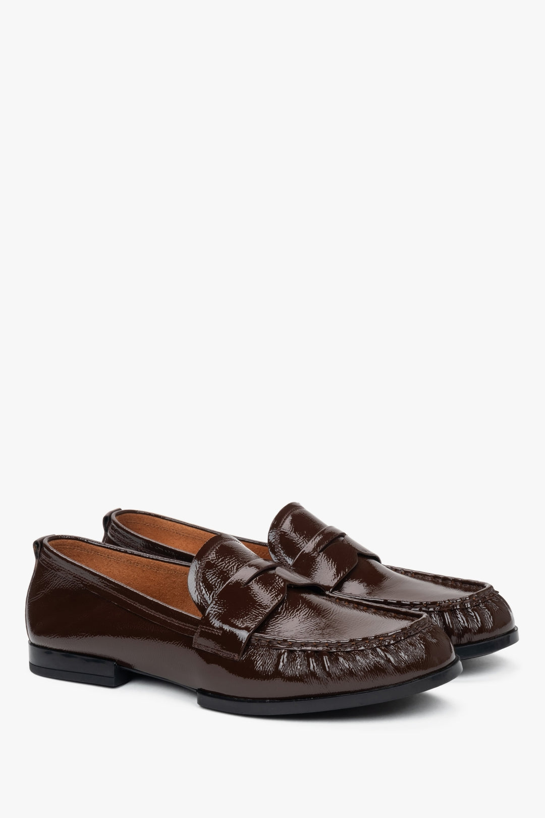 Dark brown patent leather women's loafers made of genuine leather by Estro.
