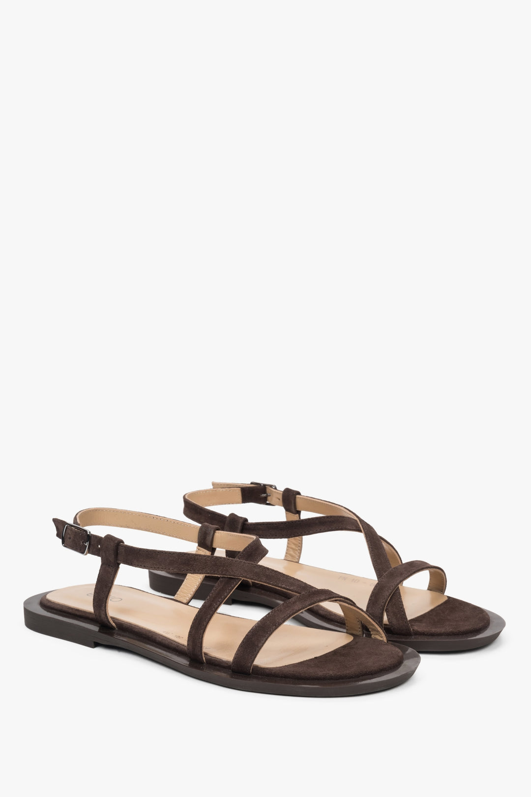 Stylish brown women's sandals by Estro, made of genuine velour, featuring a distinctive crisscross strap.
