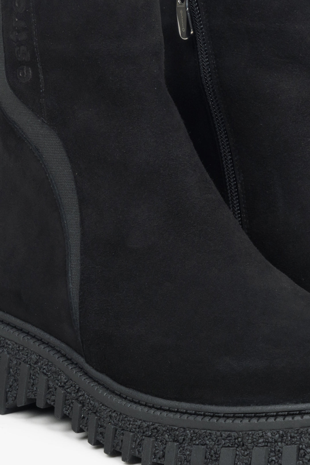 Women's black velour ankle boots - a close-up on details.