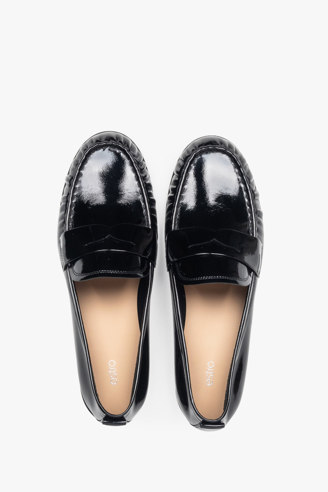 Elegant black women's loafers made of patent leather by Estro.