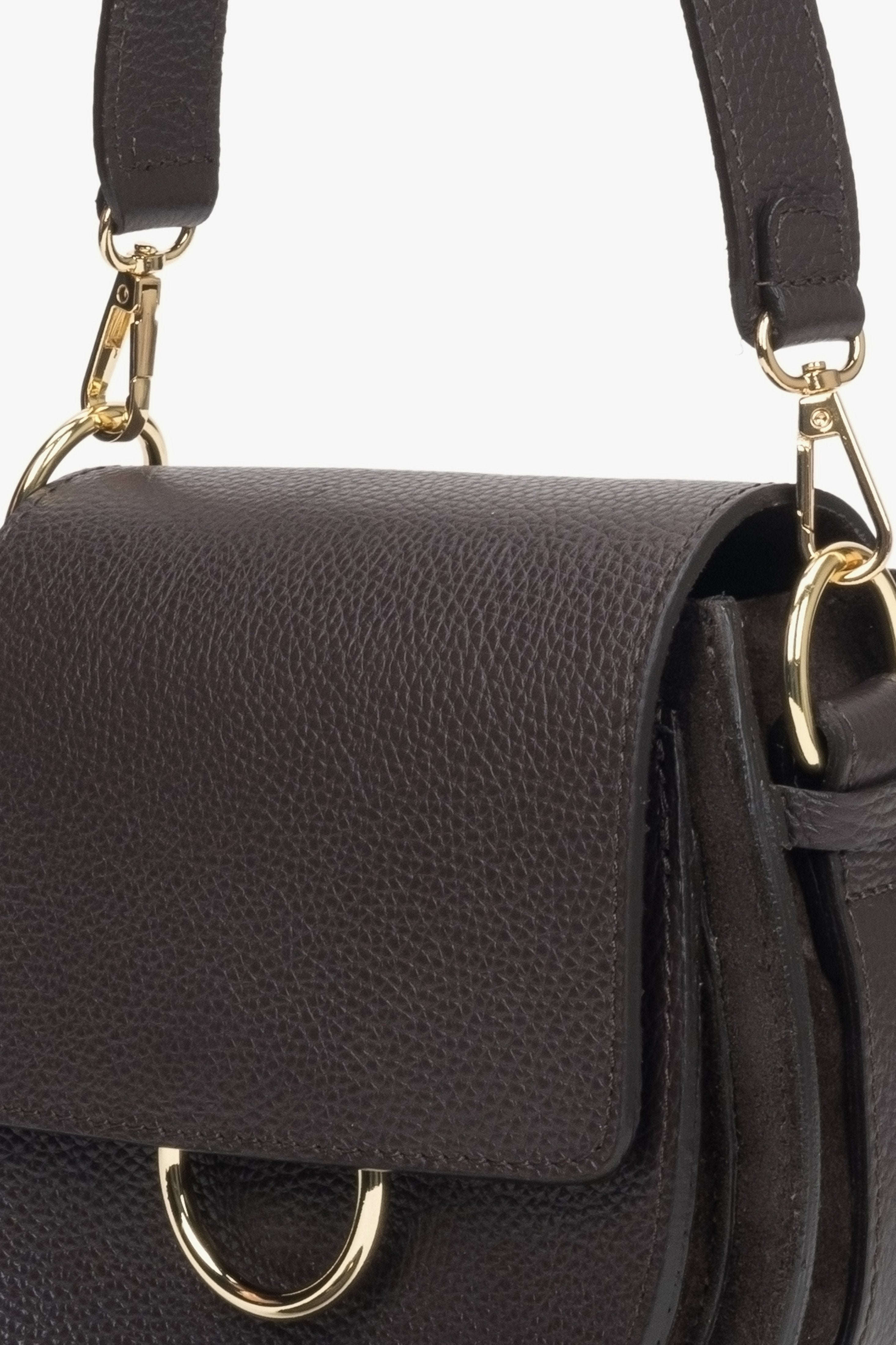 A dark brown leather women's handbag by Estro in the shape of a horseshoe - close-up of the detail.