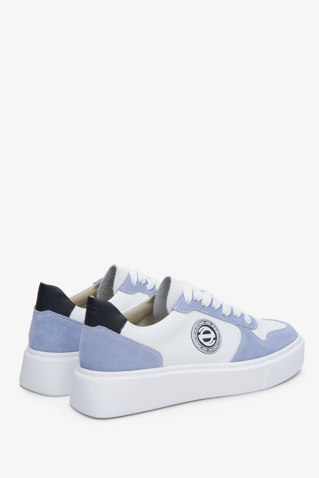 Blue and white sneakers, made from leather and natural velvet for women - presentation of the back part of the footwear.