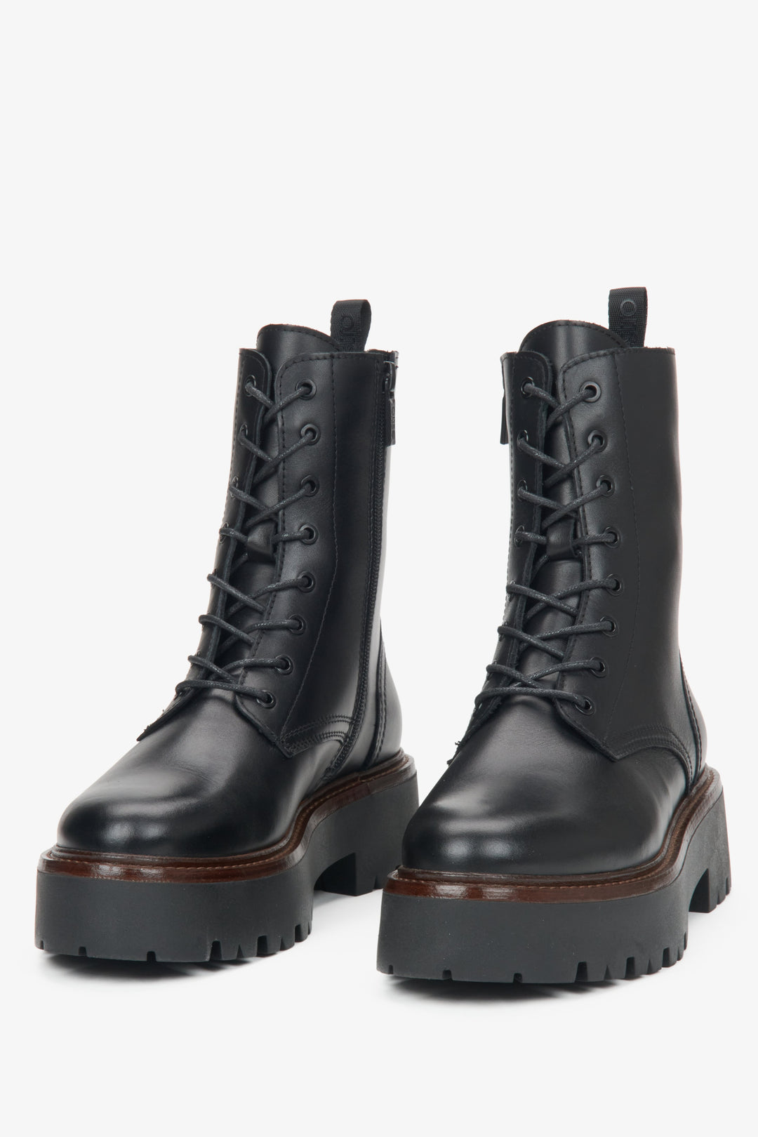Women's black leather ankle boots by Estro - close-up of the front of the model.