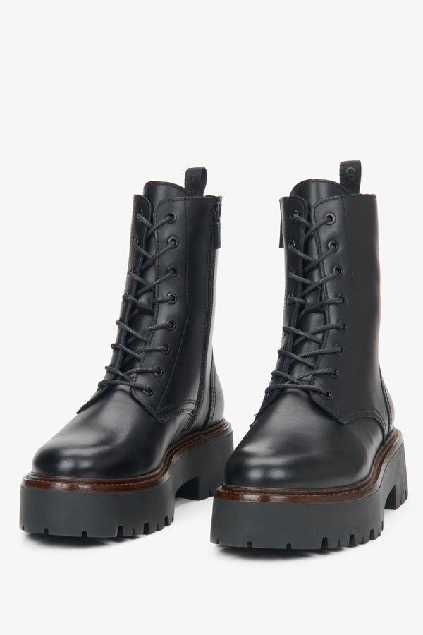 Women's black leather ankle boots by Estro - close-up of the front of the model.