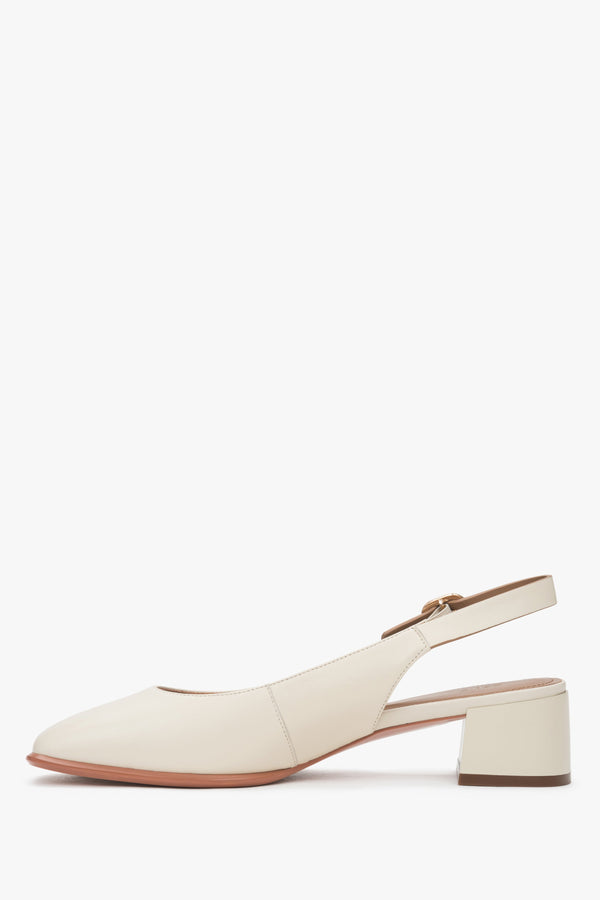 Stylish Estro women's pumps in a light beige shade, slingback style, set on a comfortable, low heel.