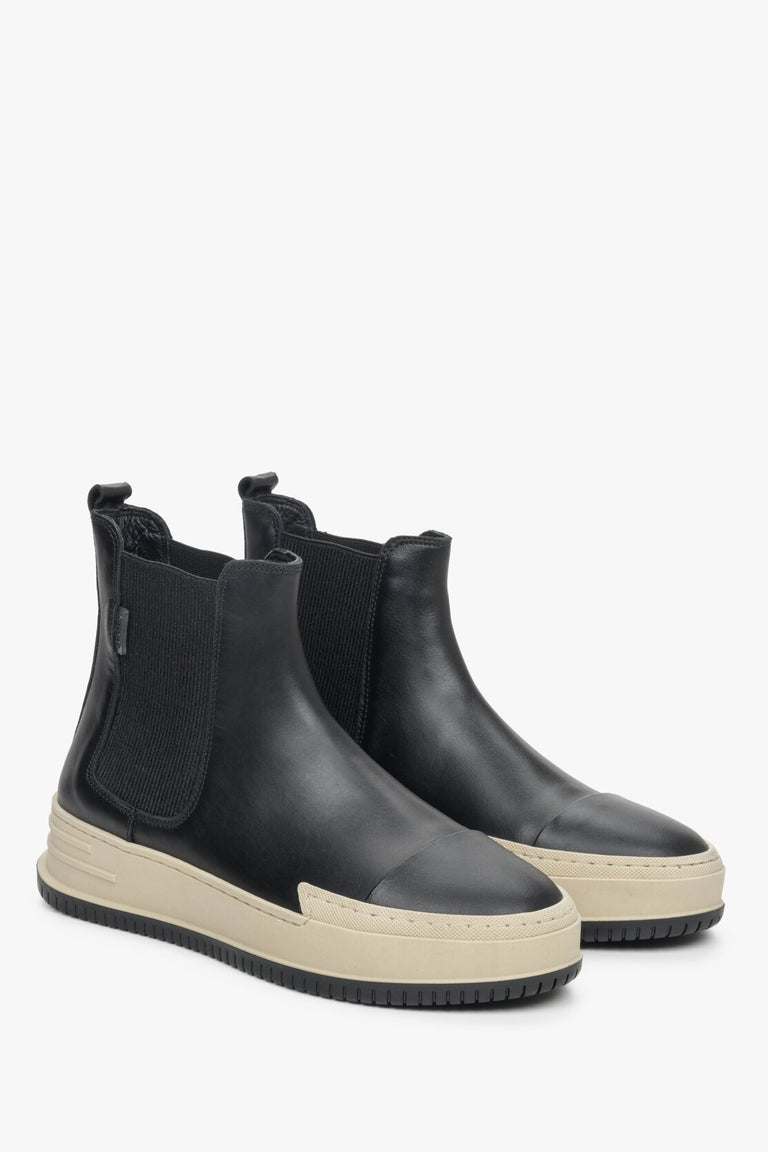 Women's Black leather boots by Estro.