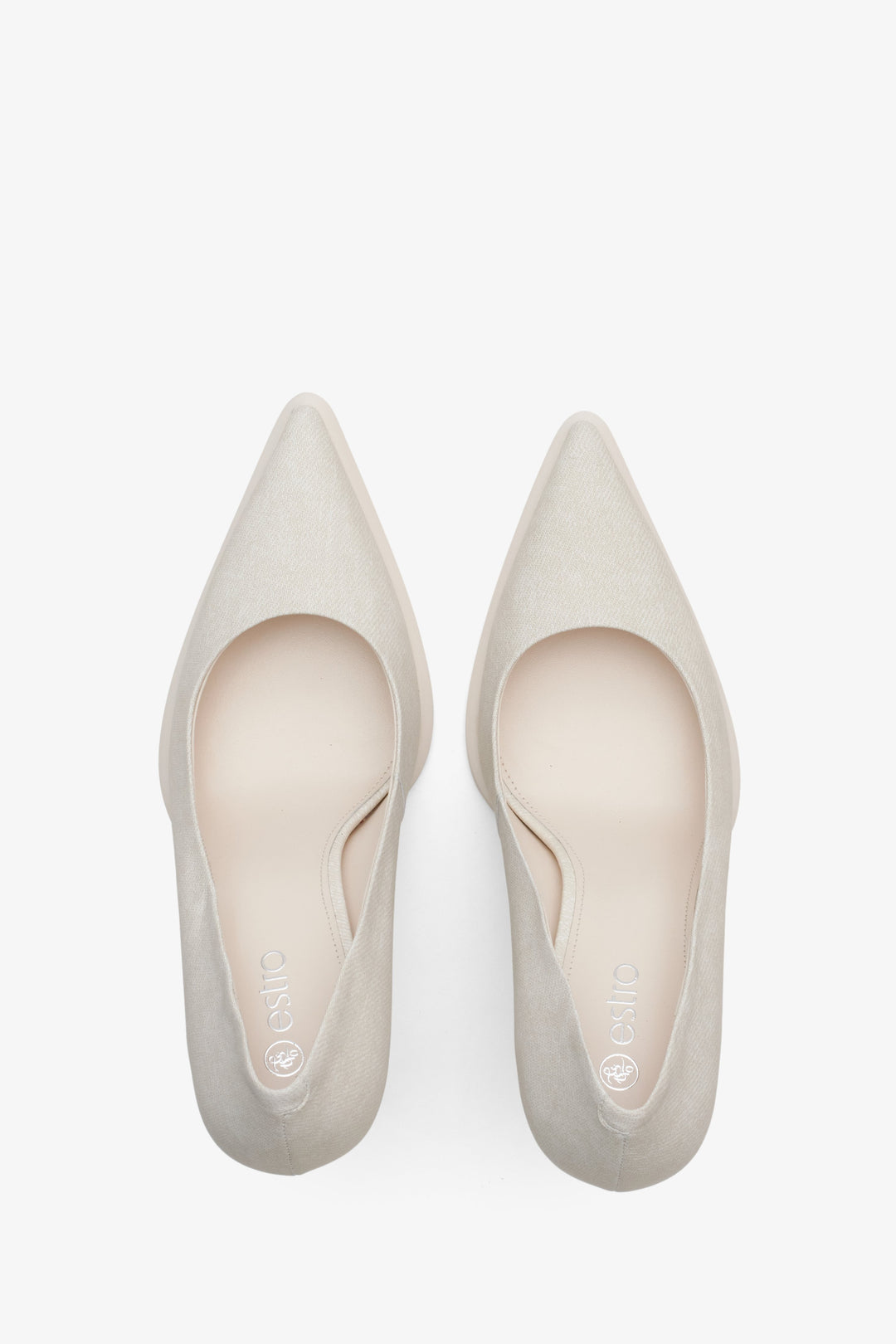 Women's light beige pointed-toe pumps by Estro - top view presentation.