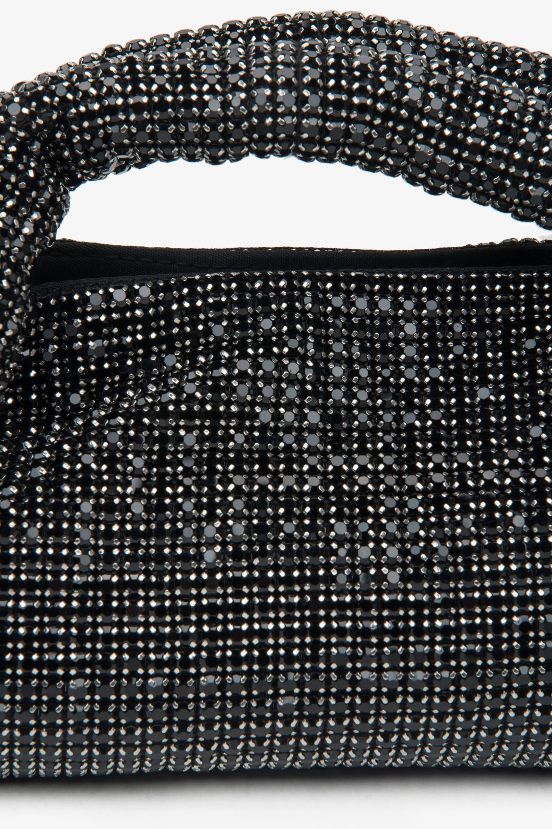Stylish black evening women's bag, embellished with crystals and complemented by a textured handle from Estro.