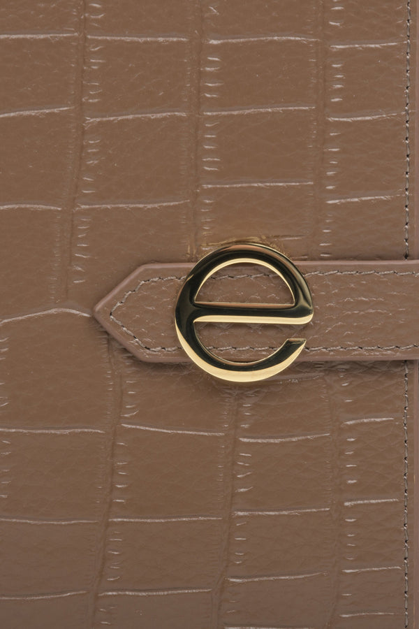 Women's large brown leather wallet by Estro - close-up on details.