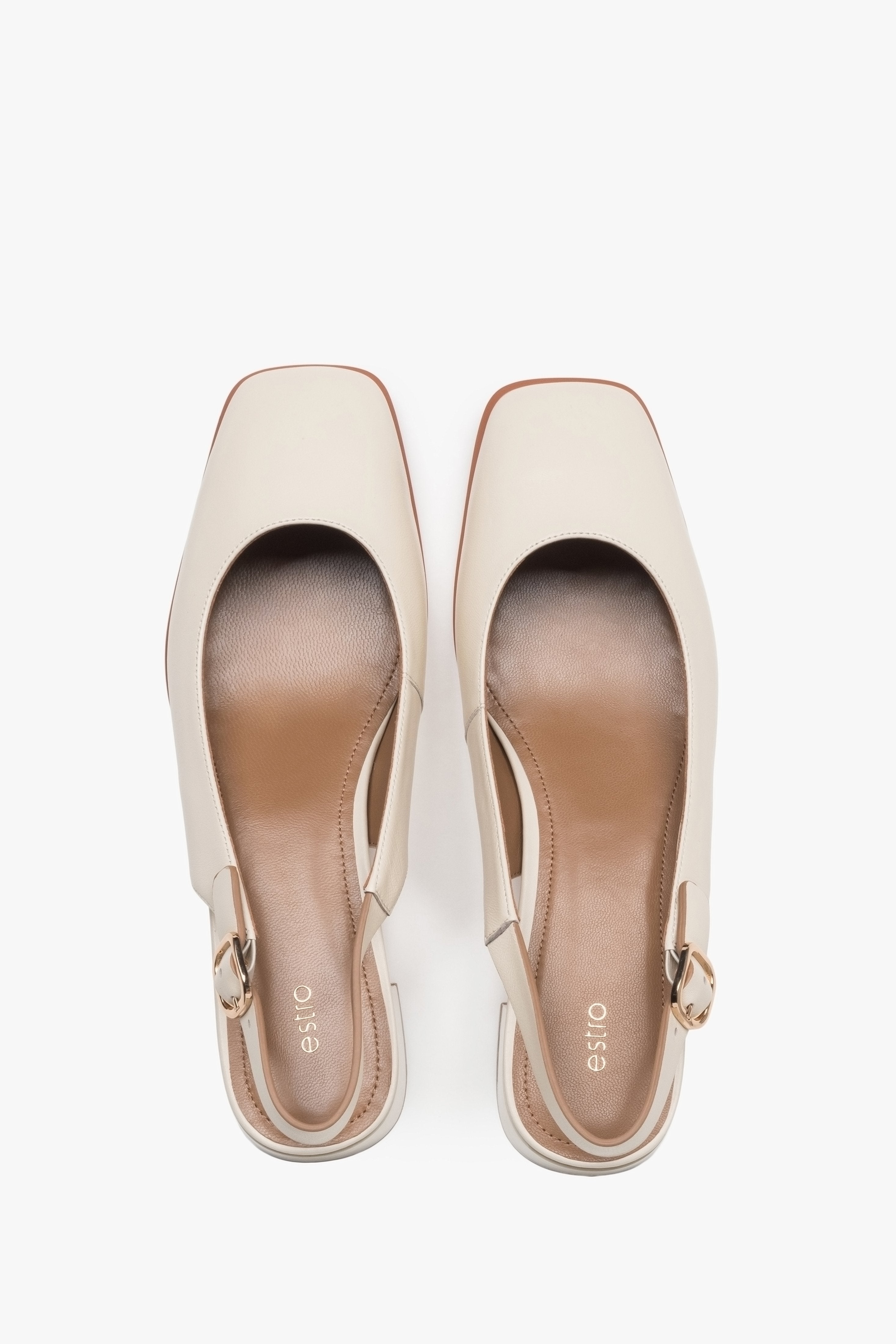 Light beige Estro pumps, with a slingback design, featuring a comfortable low heel.