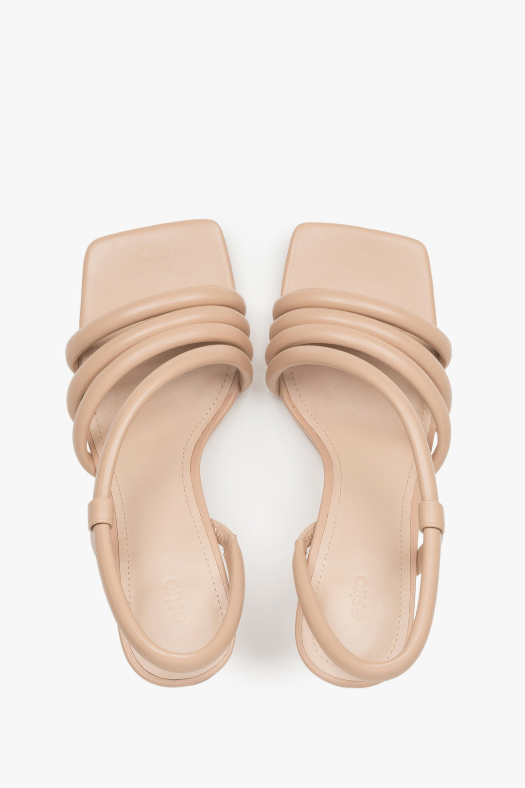Heeled women's strappy sandals made of genuine leather in beige by Estro.