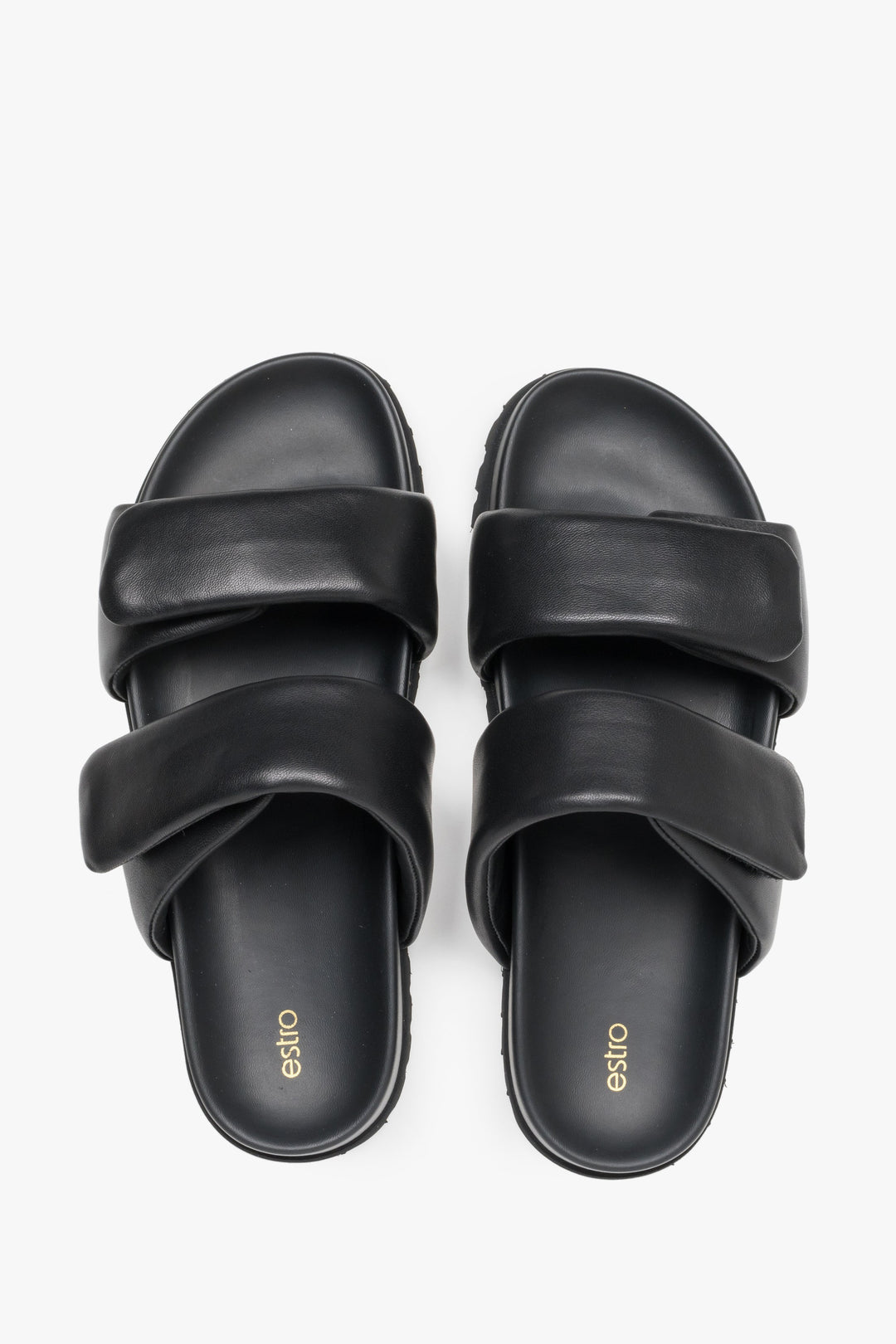 Stylish black women's slides by Estro, made from high-quality genuine leather and featuring soft, delicate straps.