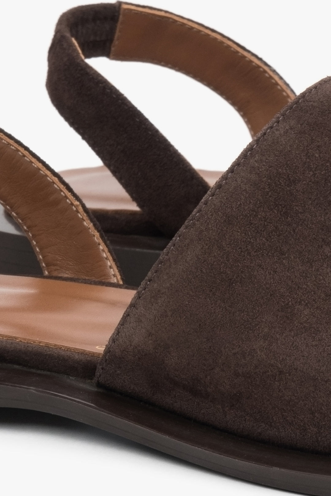 Dark brown velour women's sandals by Estro – a combination of velour softness and practical design with a covered toe line, featuring detailed accents.