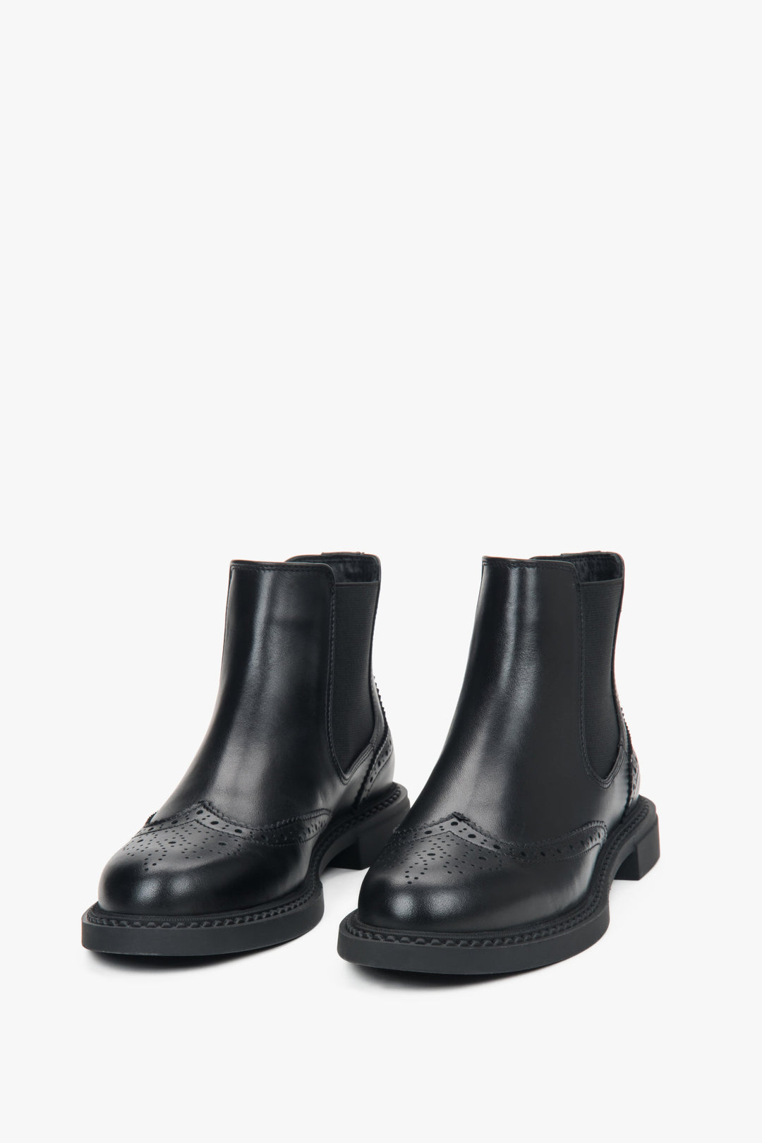 Low-cut black perforated Chelsea boots for women, crafted from high-quality premium Italian leather.