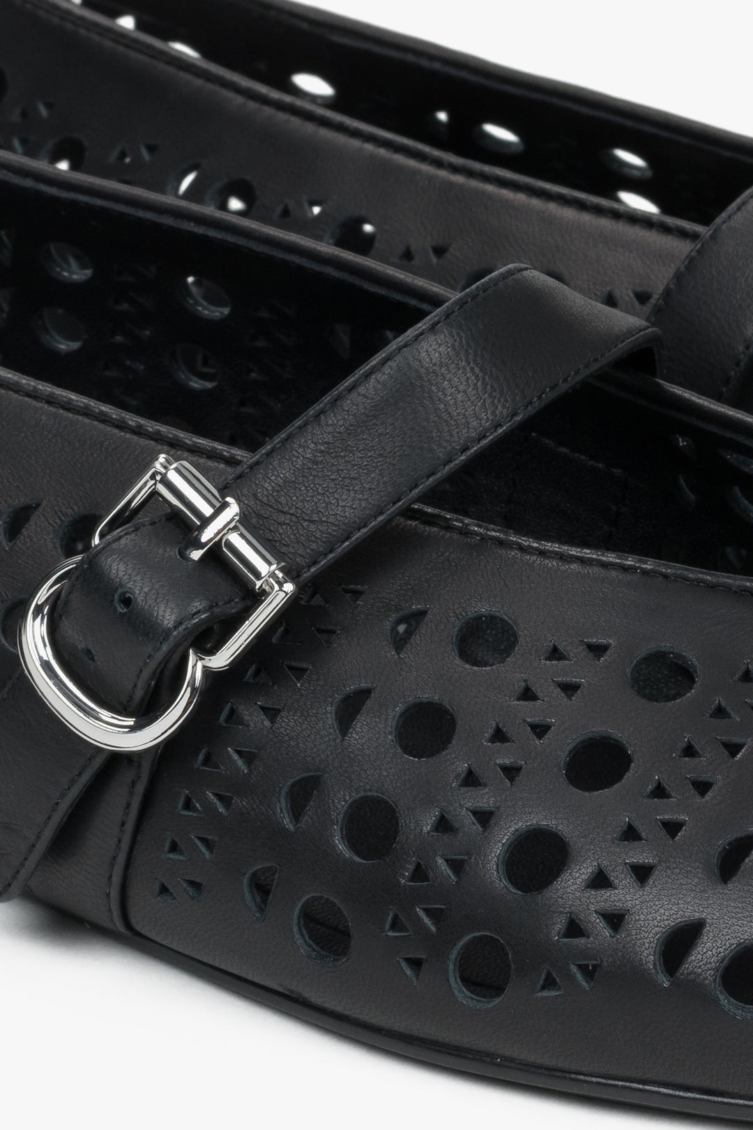 Black perforated women's ballet flats made of genuine leather by Estro - details.