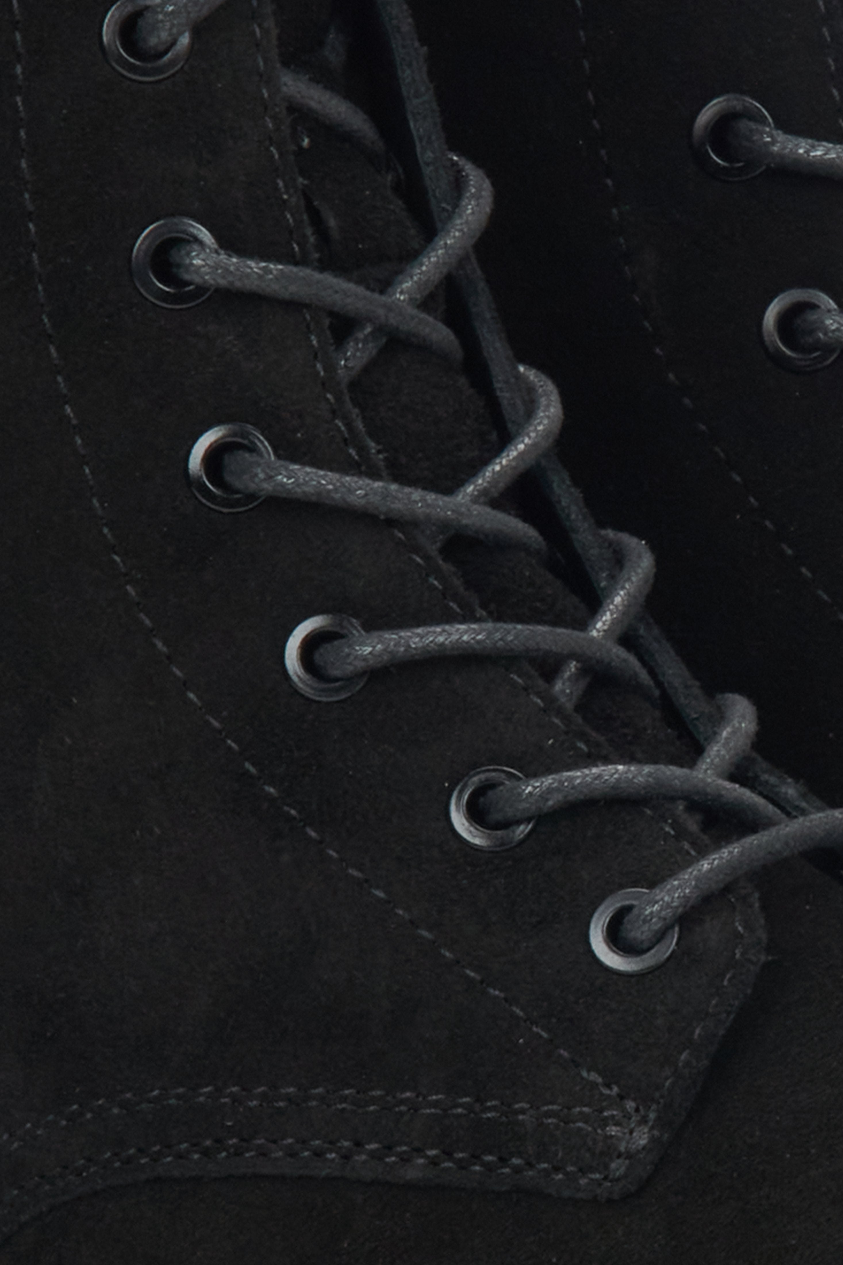 Women's black velour ankle boots by Estro - close-up of the details.