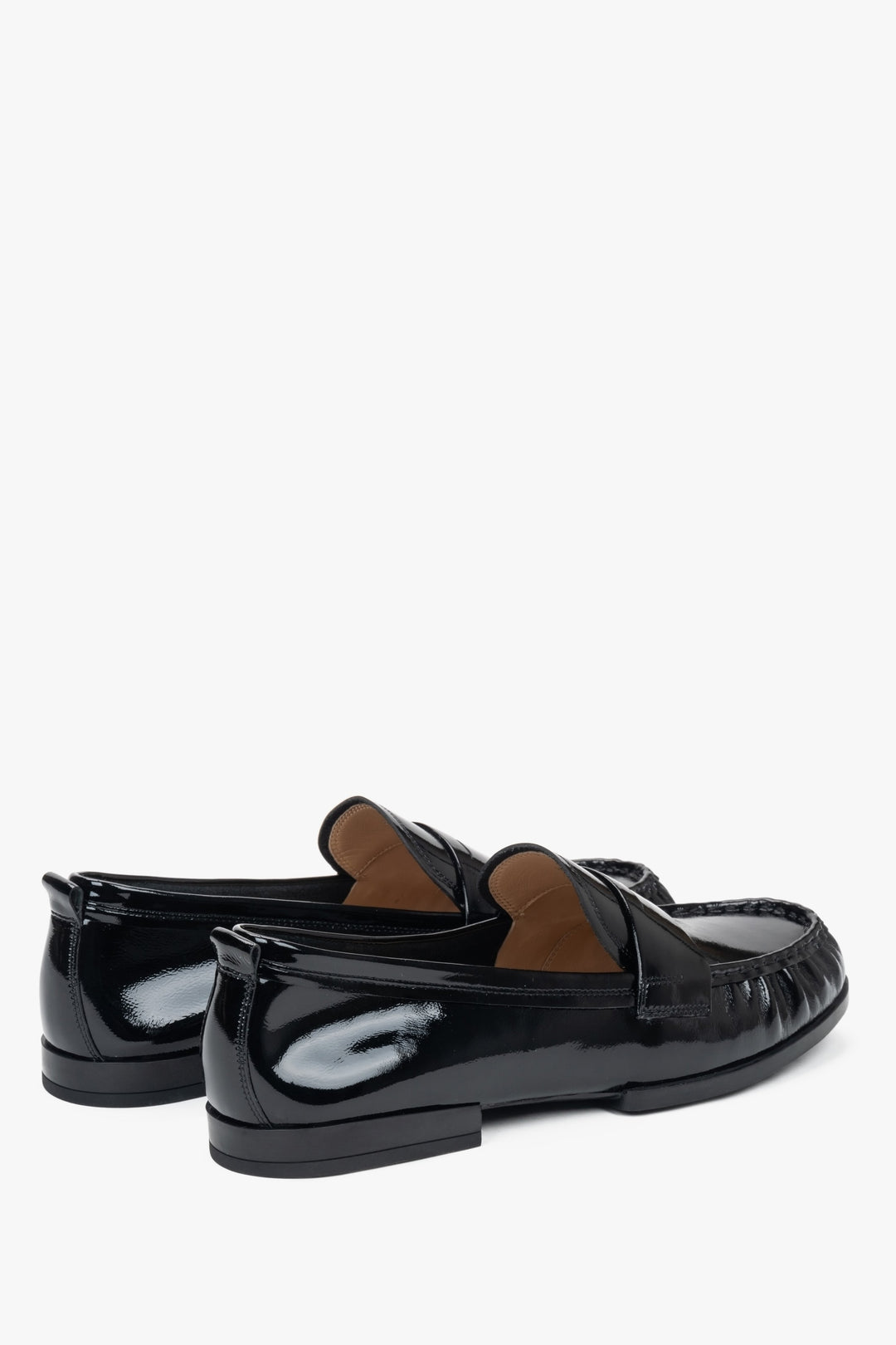 Patent leather women's loafers by Estro in a shade of black.