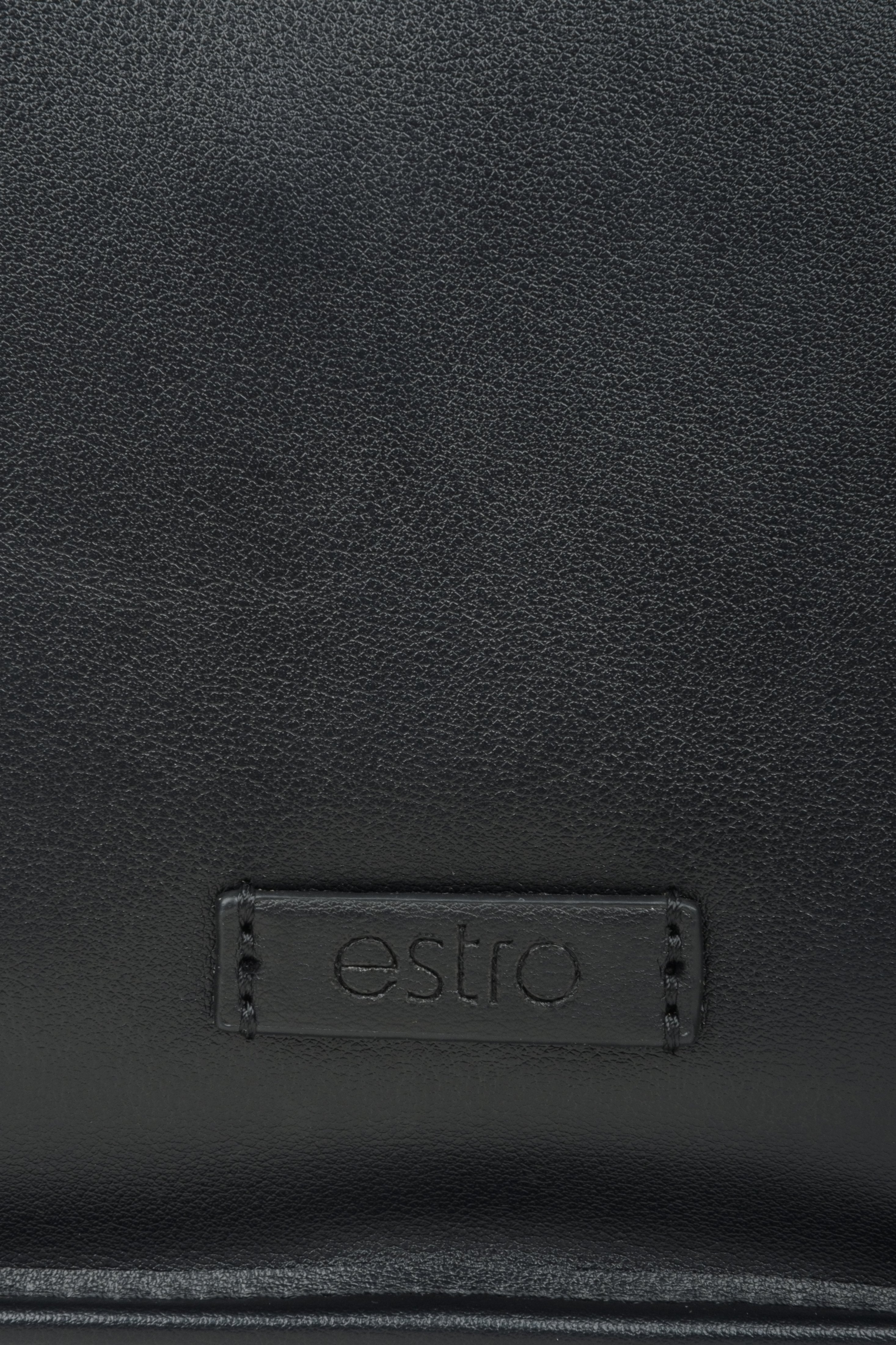 Women's black leather shoulder bag - close-up on the details.
