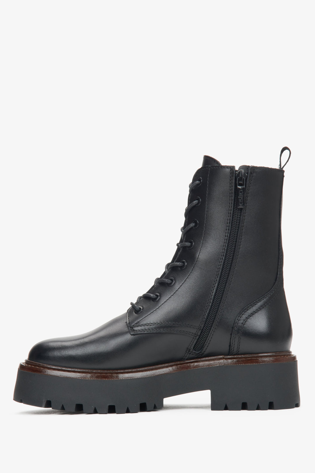 Women's black leather ankle boots made of genuine leather by Estro - side profile of the shoe.