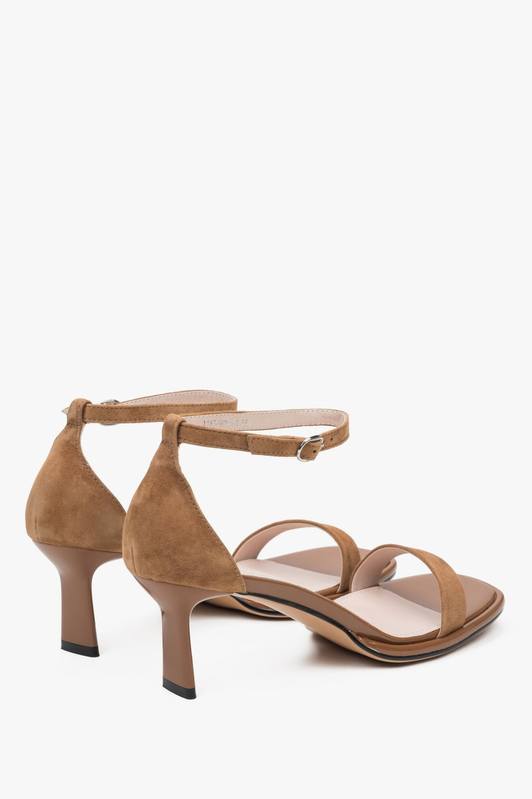 Elegant brown Estro women's sandals, made of genuine leather, set on a stylish heel.