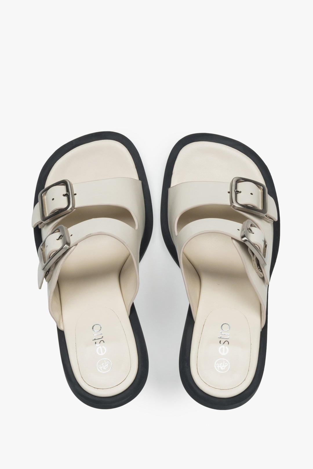 Leather, women's white mules by Estro with a buckle - presentation of the footwear from the top.