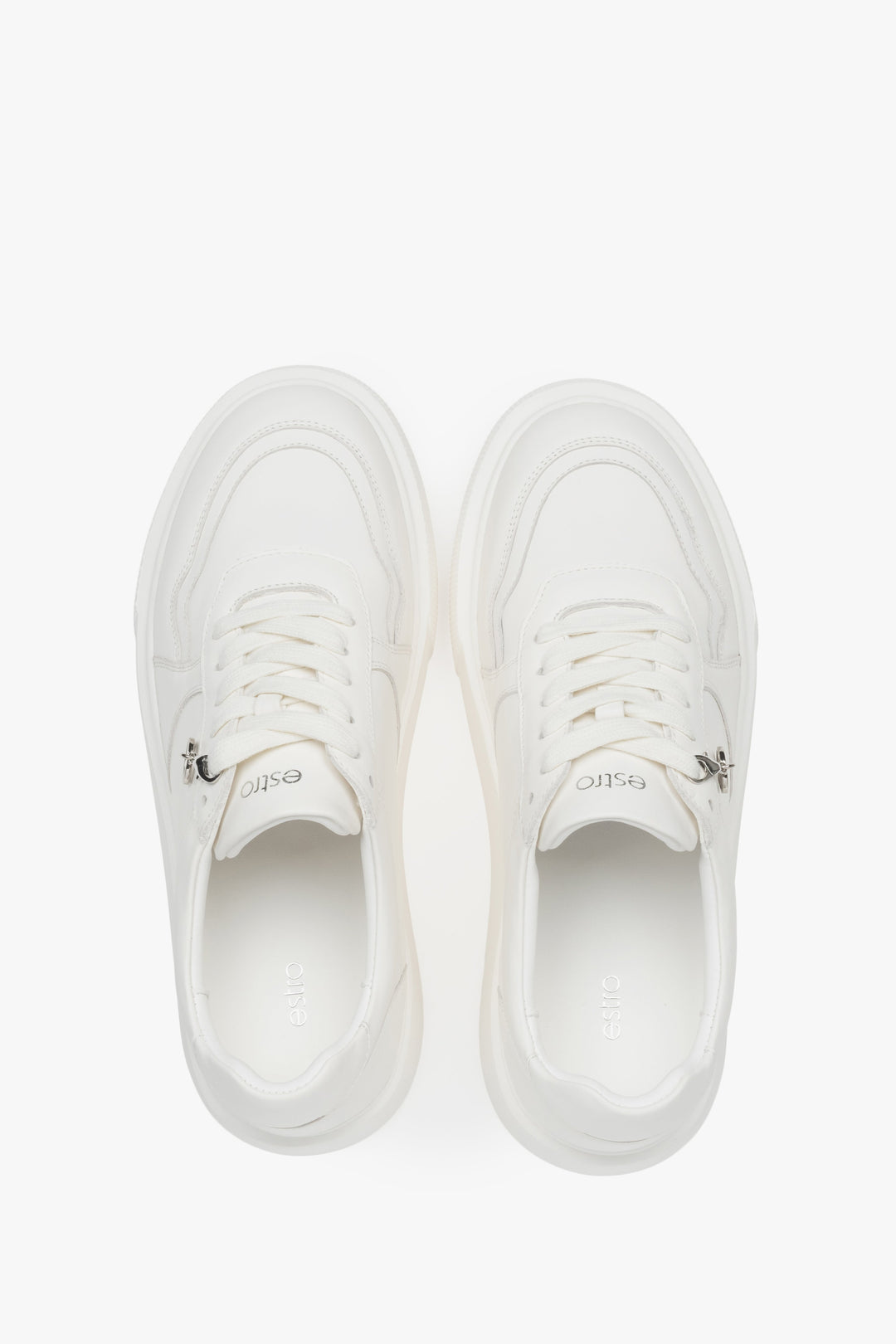Lightweight white Estro women's sneakers made of genuine leather, with a flexible sole – a combination of freedom and trendy design.