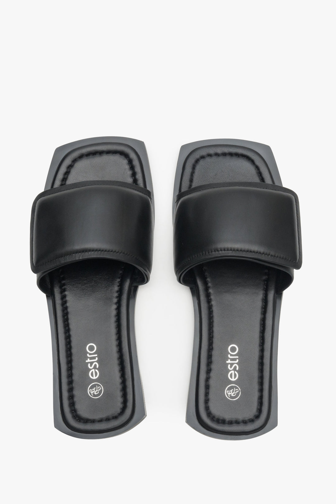 Genuine leather flat slide sandals Estro in black - presentation from above.