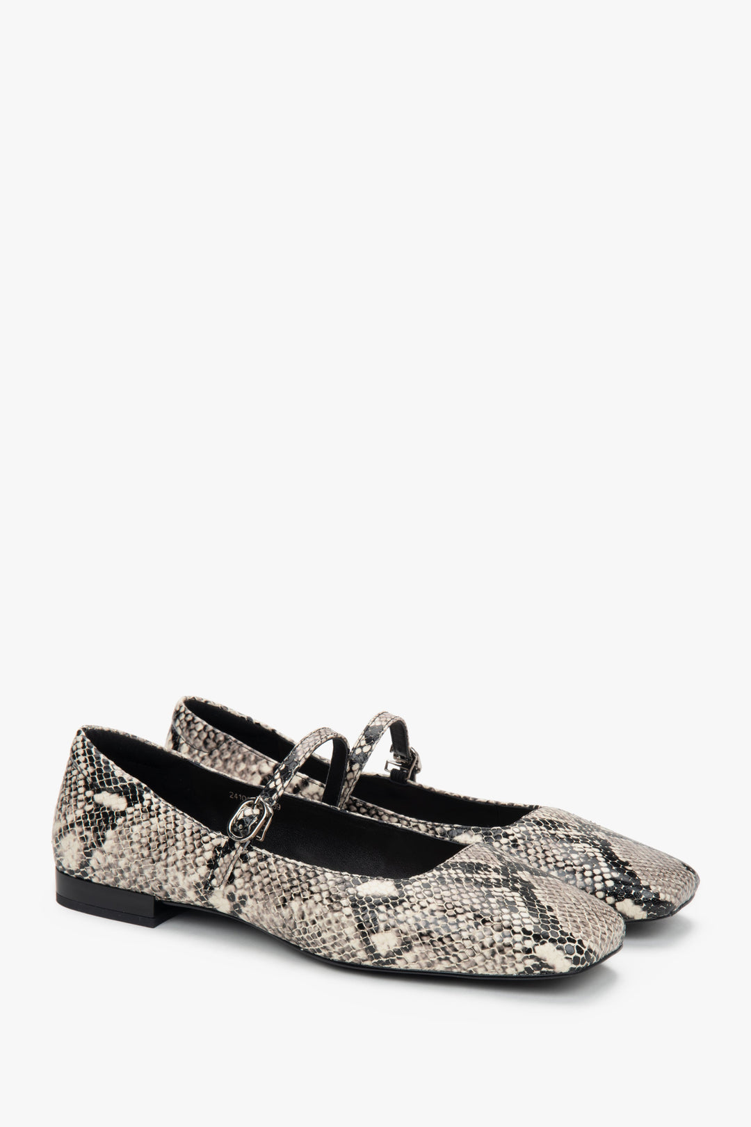 Stylish black and white Estro women's ballet flats, made of genuine leather, adorned with a trendy animal print.