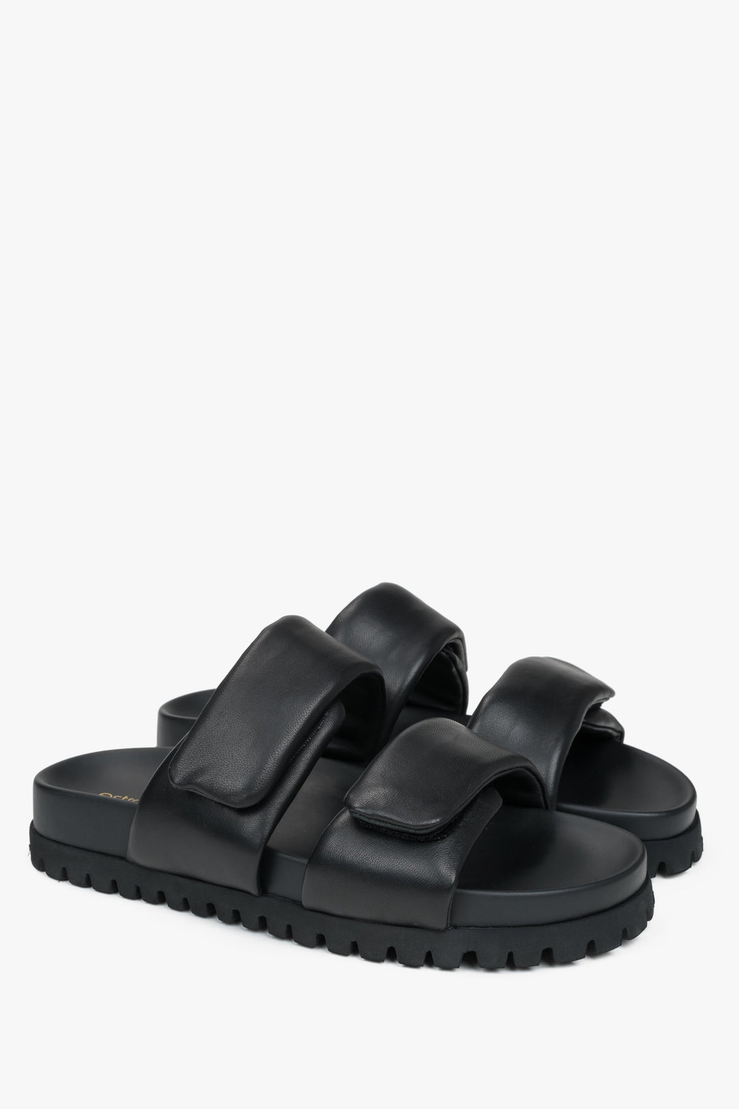 Comfortable black women's slides by Estro, made from genuine leather and featuring soft straps for added comfort.