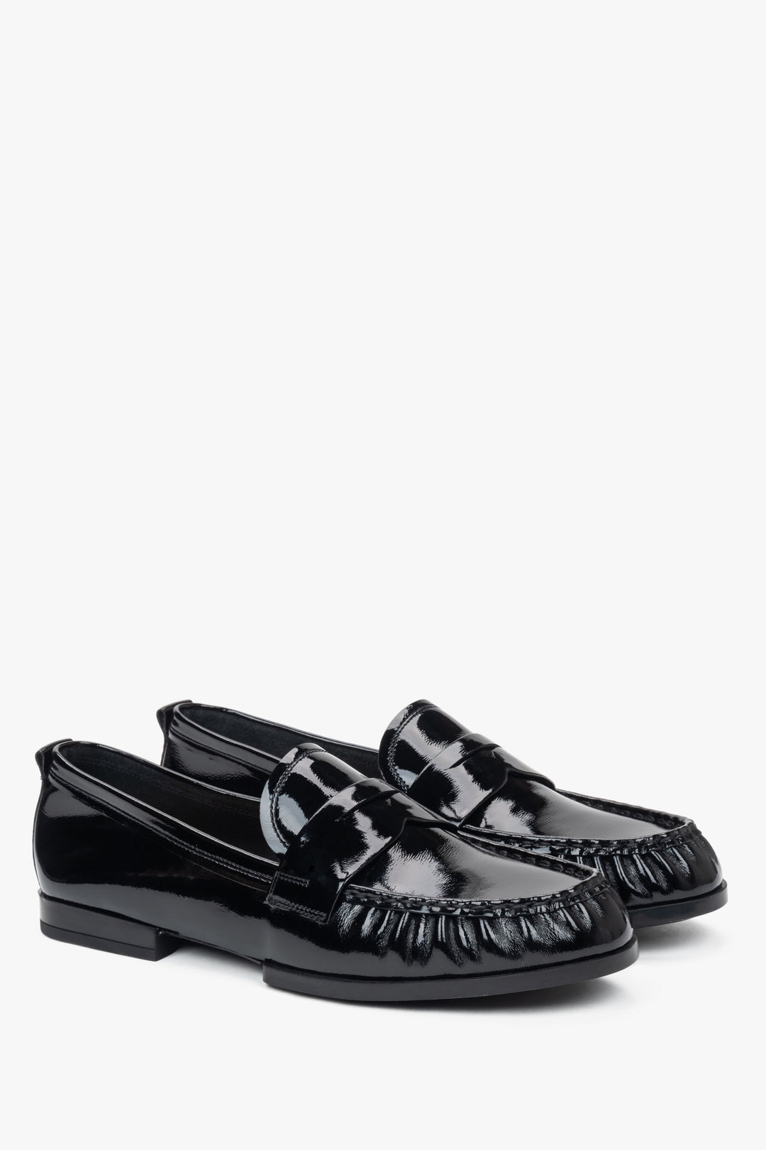 Black patent leather women's loafers made of genuine leather by Estro.