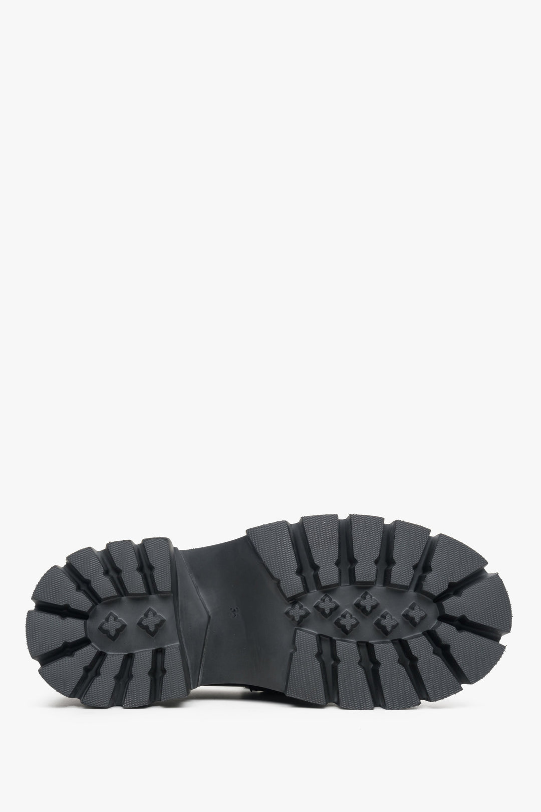 Women's moccasins with a wide sole made of natural leather in black - close-up on the sole.
