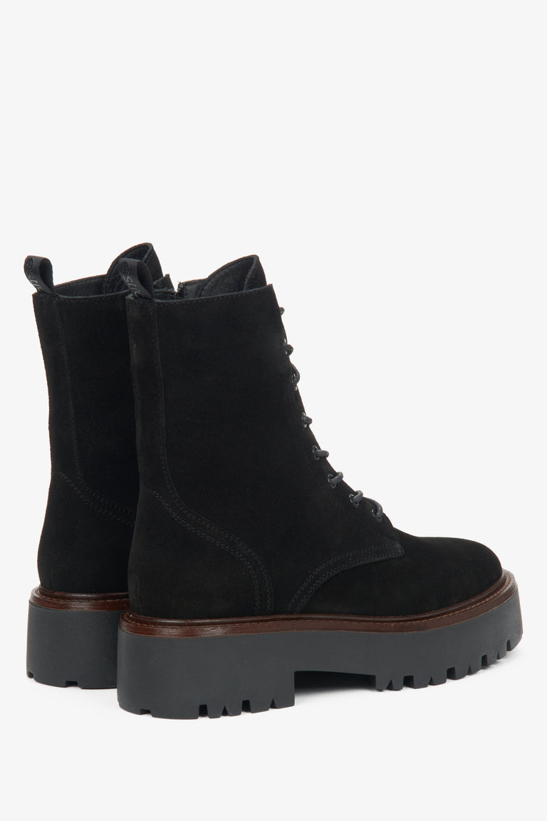 Women's black ankle boots by Estro - close-up of the heel counter.
