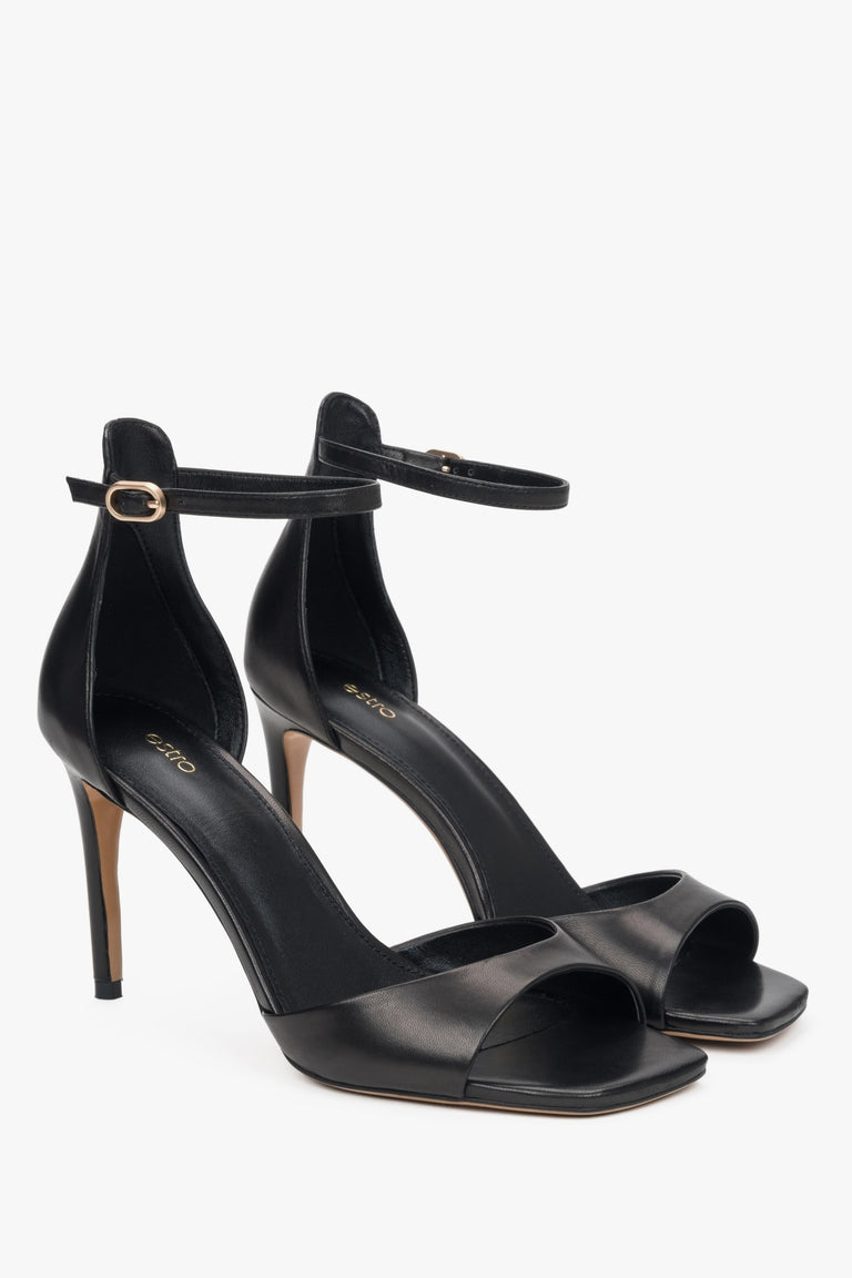 Women's refined black sandals Estro, made of luxurious genuine leather, set on a sleek high heel.