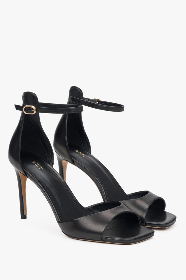 Women's refined black sandals Estro, made of luxurious genuine leather, set on a sleek high heel.