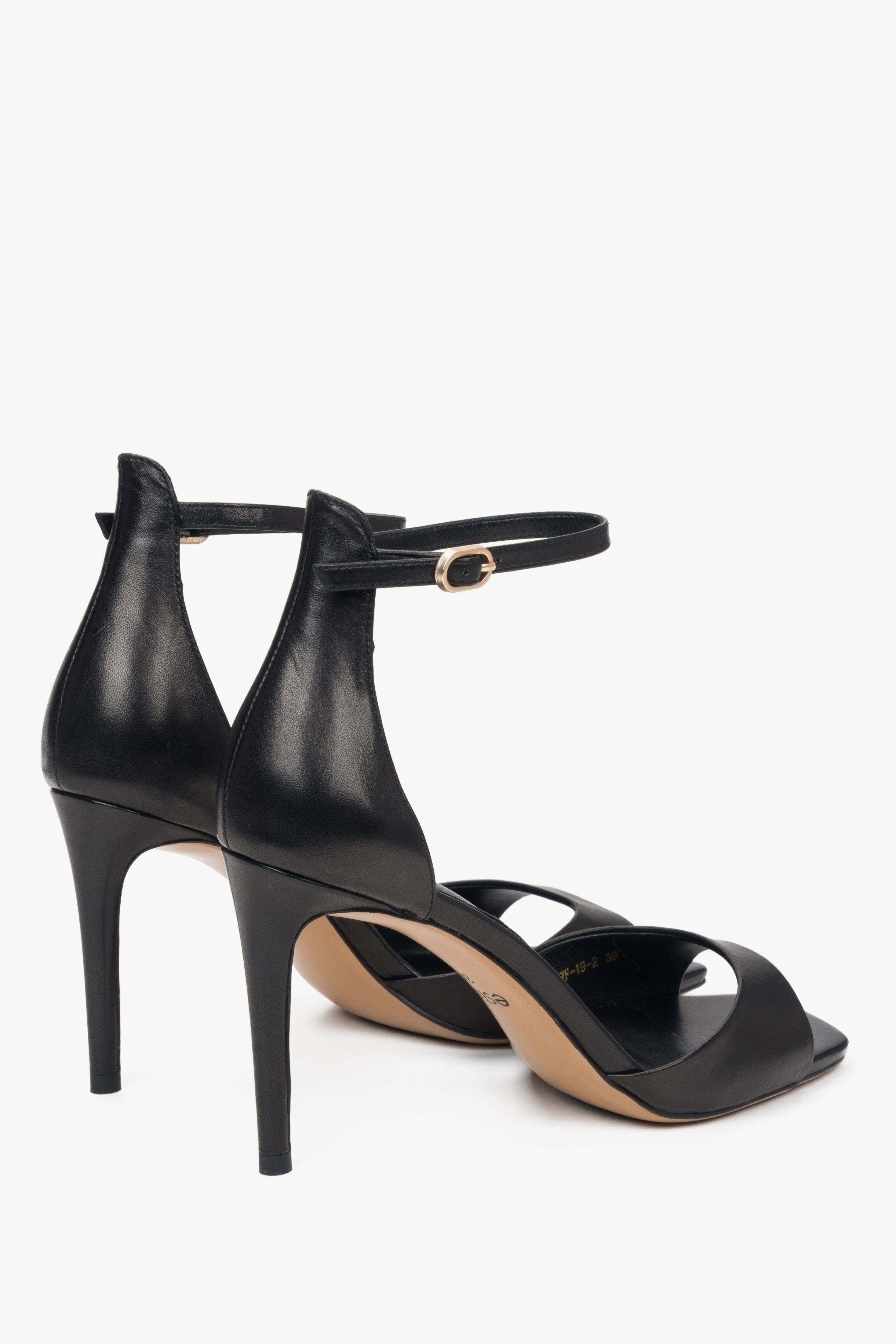 Women's versatile black sandals Estro made of genuine leather and set on a high heel.