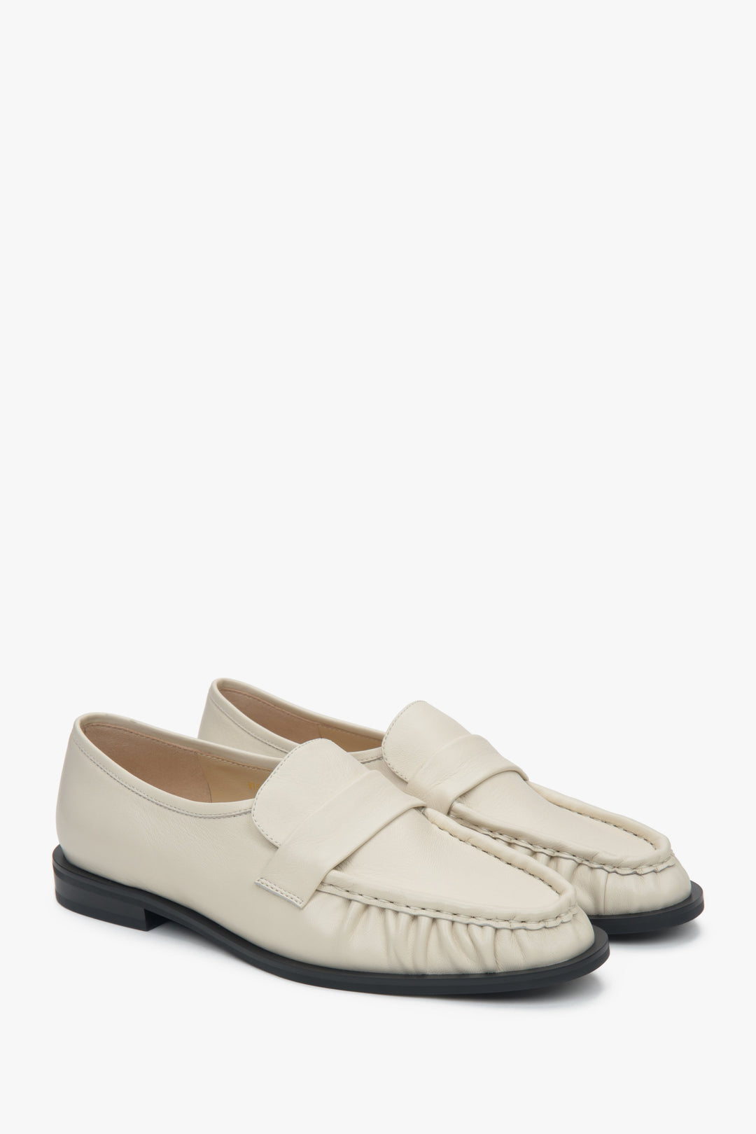 Stylish light beige women's loafers by Estro, crafted from high-quality natural leather, featuring decorative gathering.
