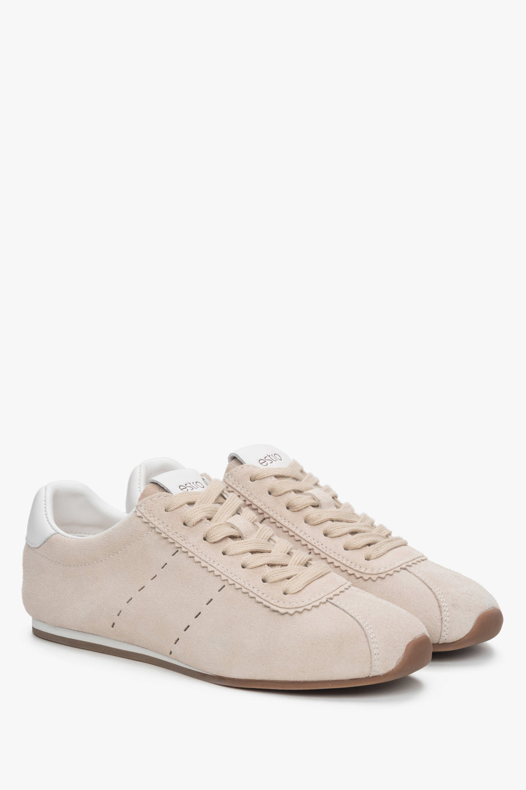 Soft women's sneakers by Estro made of beige velour with a delicate sole.