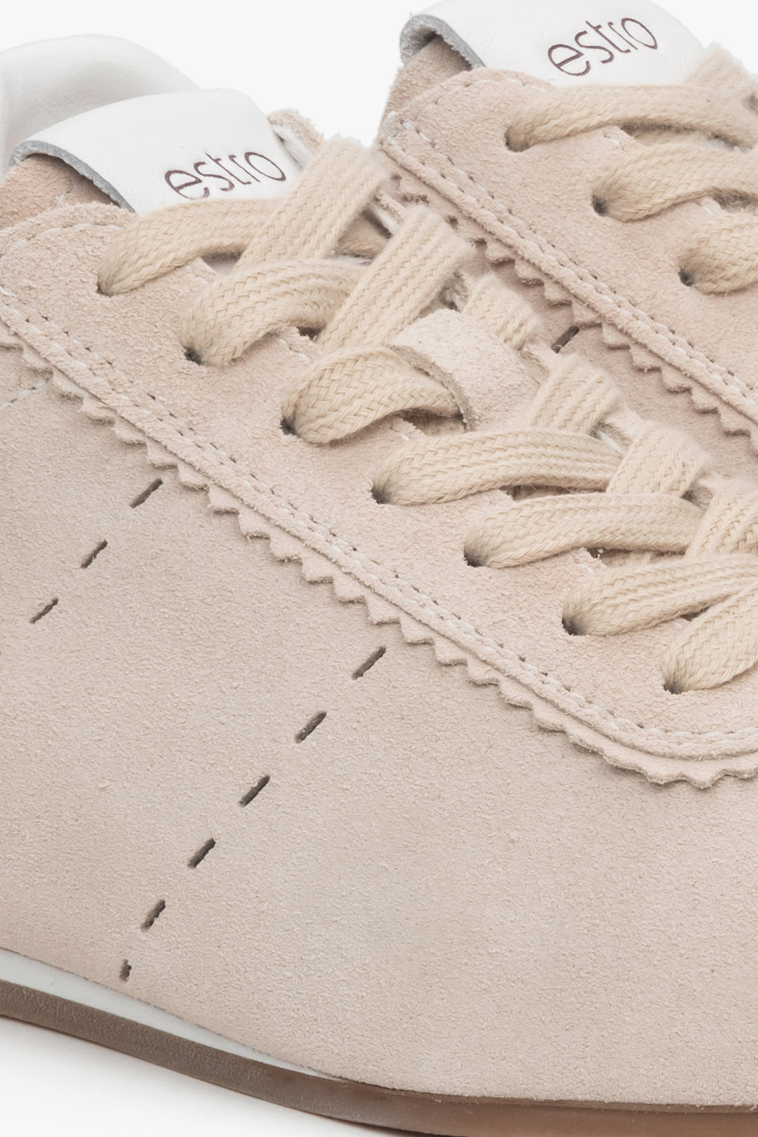 Light and soft beige women's sneakers by Estro made of natural velour – close-up of the details.