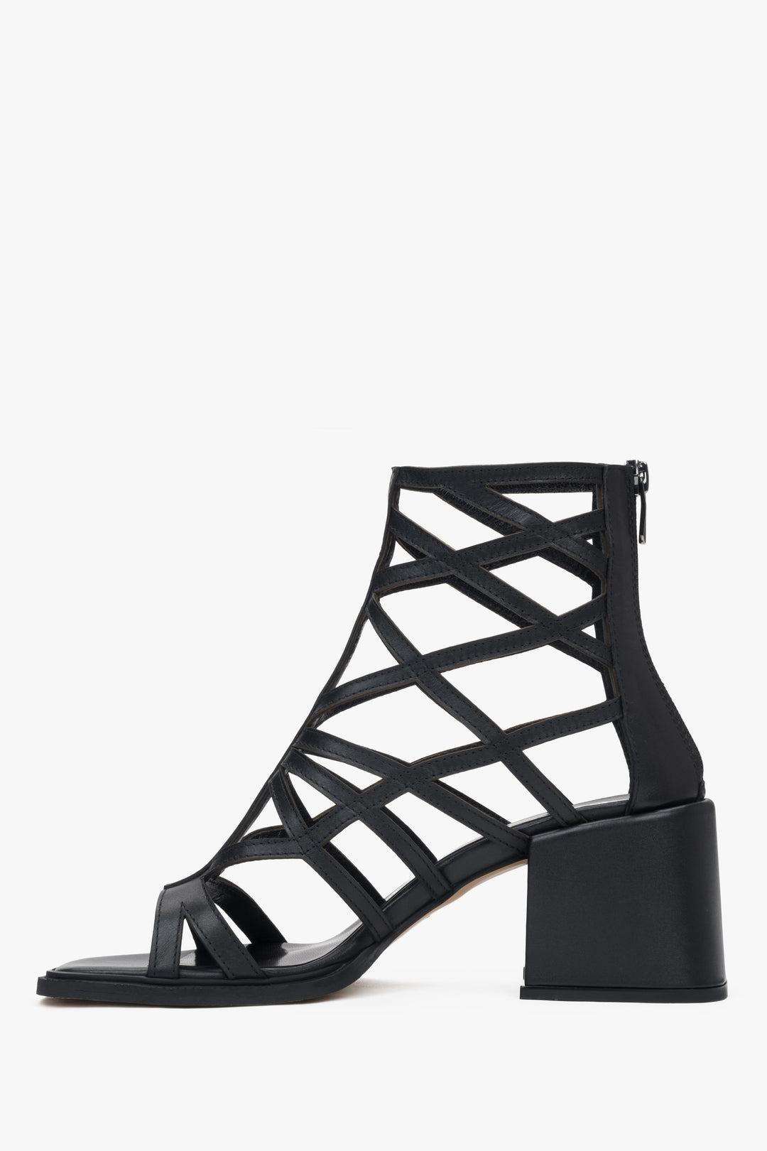 Black perforated gladiator-style heeled sandals by Estro – bold and stylish women's footwear.