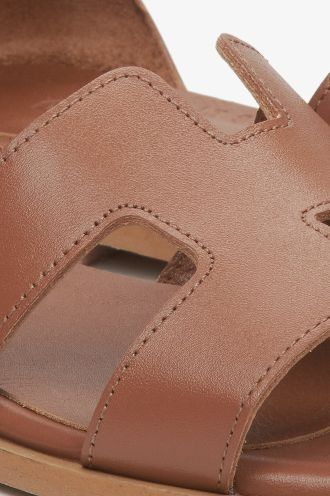 Women's brown leather sandals by Estro - close-up on the detail.