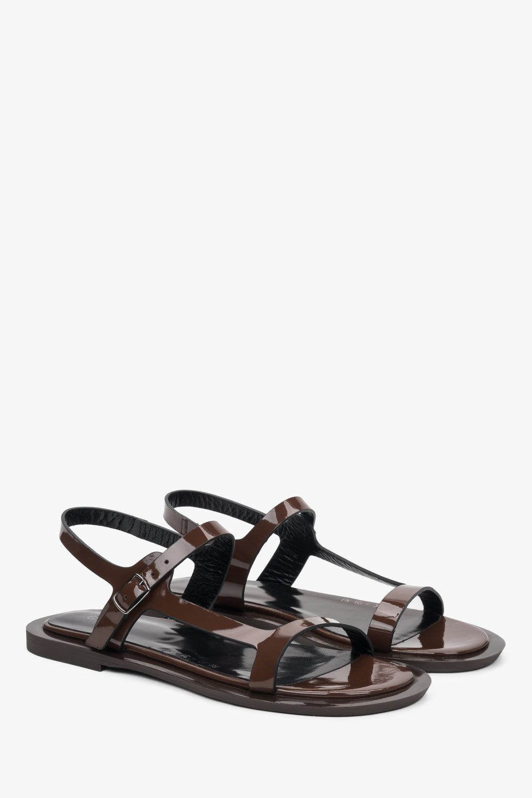 Elegant dark brown women's sandals by Estro, made of luxurious patent leather.