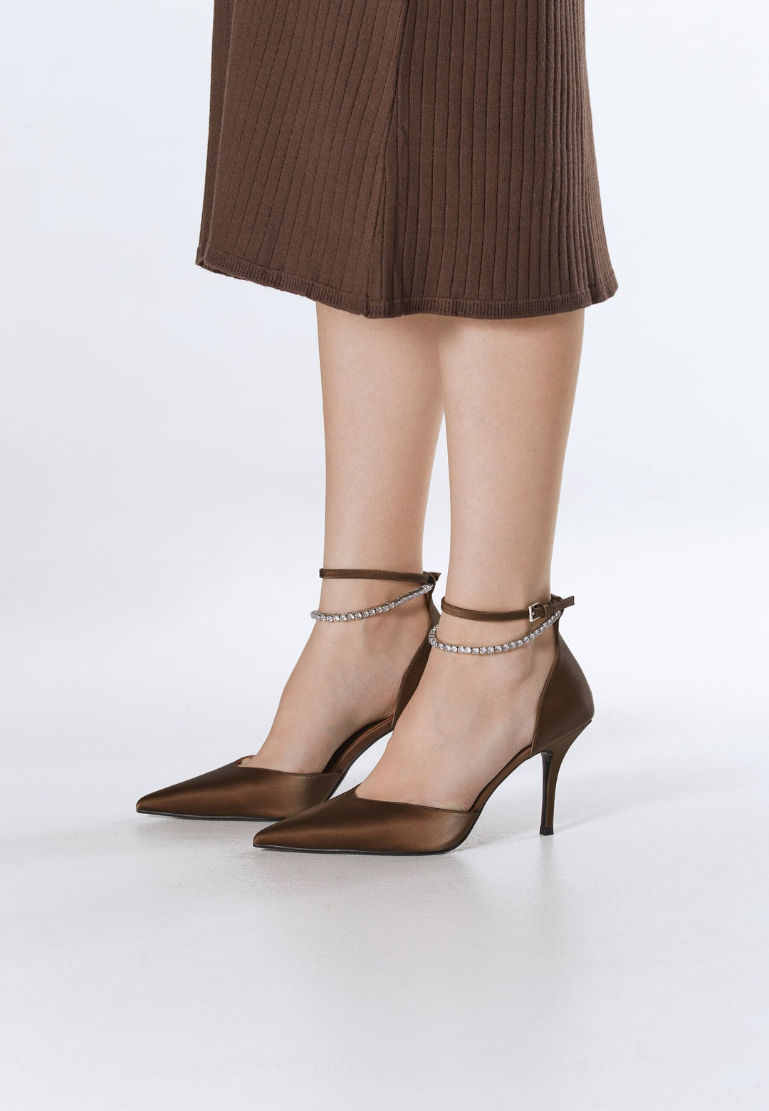 Dark brown pumps on a heel by Estro with crystals and textured finish  – on-foot presentation.