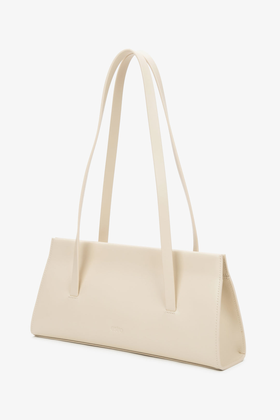 Stylish light beige women's handbag by Estro, made of natural leather and equipped with long handles for shoulder wear.
