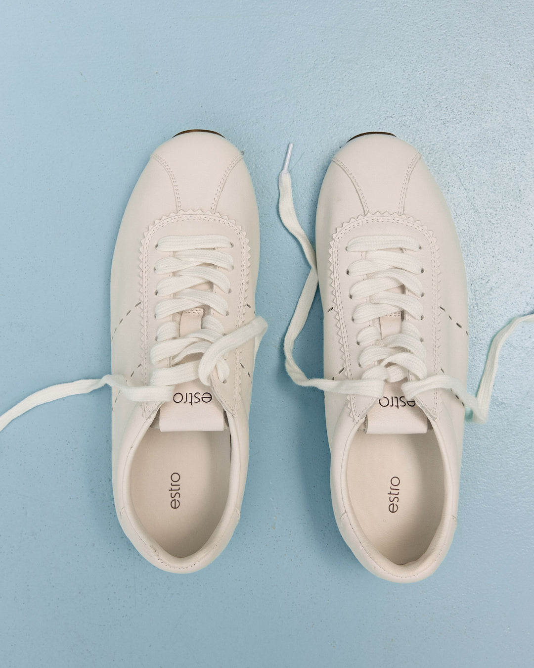 Women's White Soft Leather Sneakers with a Low Sole Estro – top view presentation.