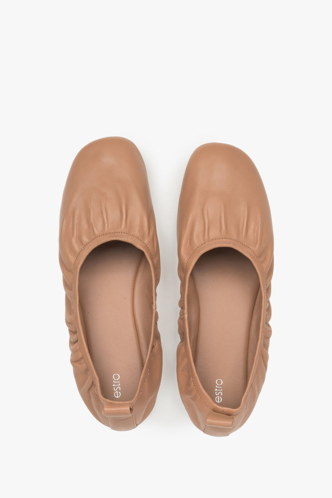 Women's beige leather comfort flats from Estro.