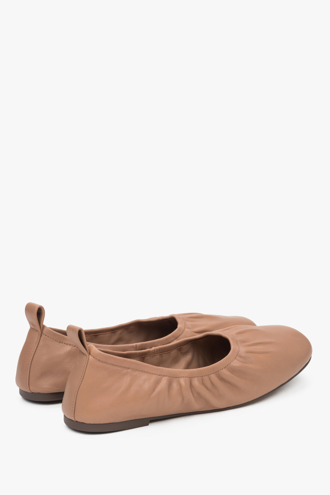 Comfortable beige leather ballet flats by Estro.
