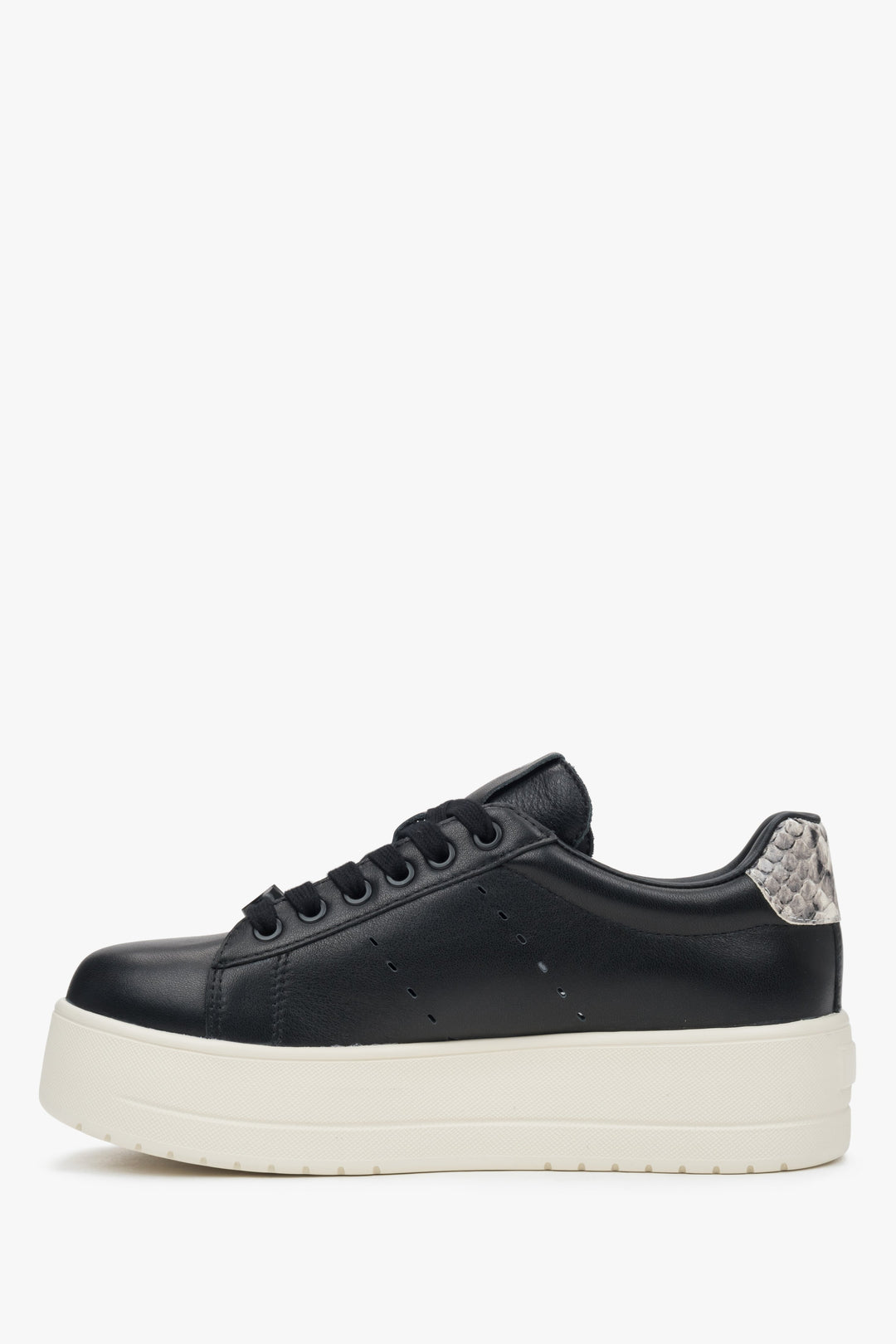 Estro women’s black leather sneakers with thick sole.