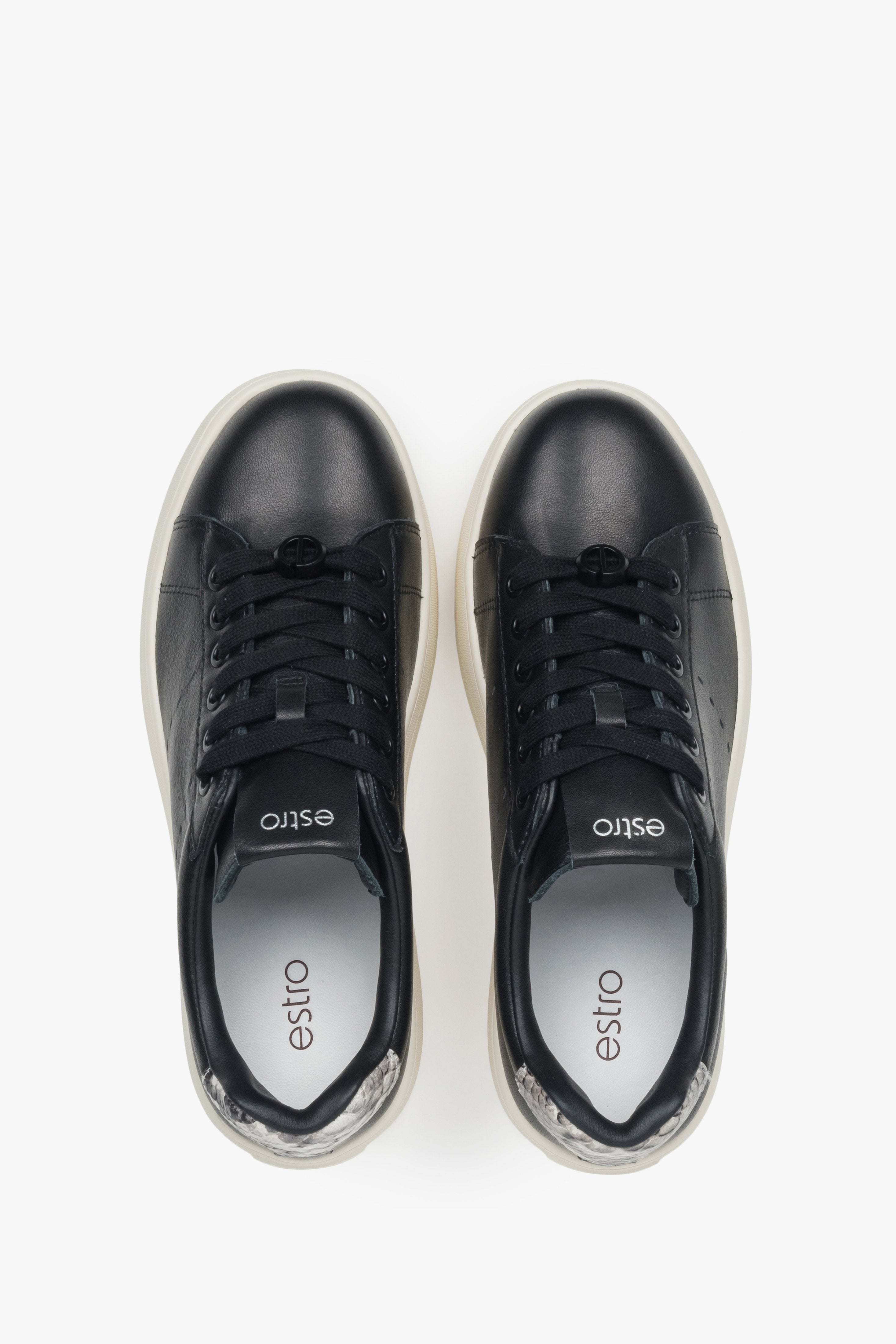Chunky sole black leather low-top sneakers for women.