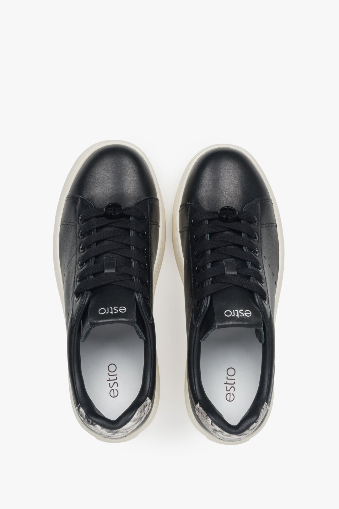 Chunky sole black leather low-top sneakers for women.