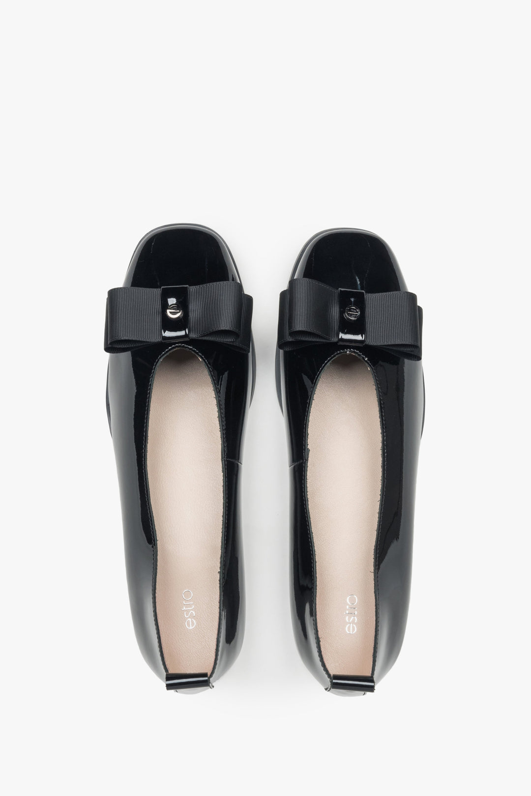 Patent black Estro ballet flats with a bow – top view.